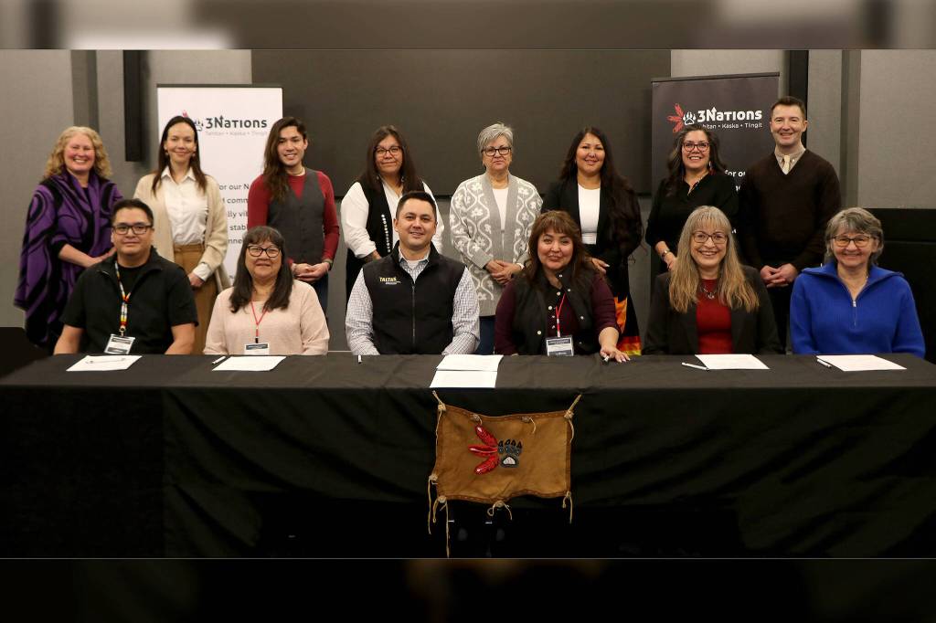 Representatives from the Tahltan, Kaska, and Taku River Tlingit Nations join provincial and health authority leaders in Whitehorse on Feb. 5 for the signing of the 3Nations Transformational Health Declaration, committing to a model of community-led, culturally grounded health care across northern B.C. Seated, from left to right: Chief Myles Manygreyhorses, Dease River First Nation; Debbie Groat, Daylu Dena Council; President Kerry Carlick, Tahltan Central Government; Spokesperson Charmaine Thom, Taku River Tlingit First Nation; Chief Marie Quock, Iskut Band Council; and Christine Ball, Tahltan Band. Standing, from left to right: Diana Clarke, Associate Deputy Minister, Reconciliation, Mental Health & Population Wellness, Ministry of Health, B.C.; Nicole Cross, Vice President, Indigenous Health and Chief Planning & Quality Officer, Northern Health Authority; Ernie French-Downey, First Nations Health Council, North Central Representative; Tracey Woods, First Nations Health Council, North West Representative; Bev Lambert, First Nations Health Council, North East Representative; Crystal French, Vice President, Regional Operations Northern Region, FNHA; Monica McAlduff, CEO, First Nations Health Authority; and Ciro Panessa, President & CEO, Northern Health Authority.