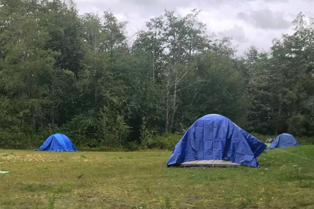 Tents set up in the District lot near Mountainview Square over the summer. Council has voted unanimously to support sending a resolution to the North Central Local Government Association urging the province to convert temporary emergency winter shelters into permanent, year-round housing. File photo